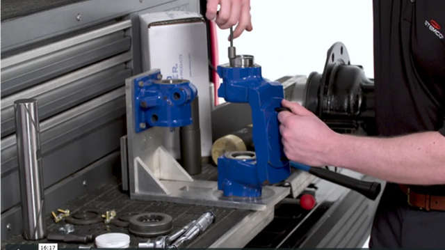 A man working with a King Pin Kit